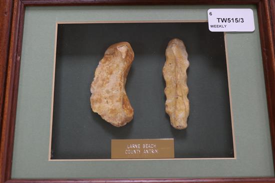 A collection of framed Neolithic and other tools and flint arrow heads,